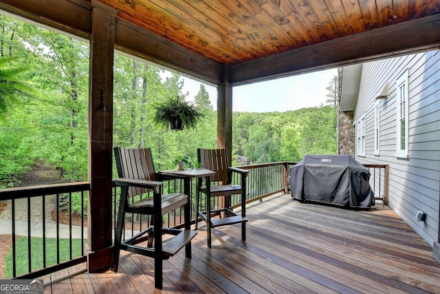 676 N Shore Dr, Cleveland, GA 30528 - wooden deck with grilling area and a forest view