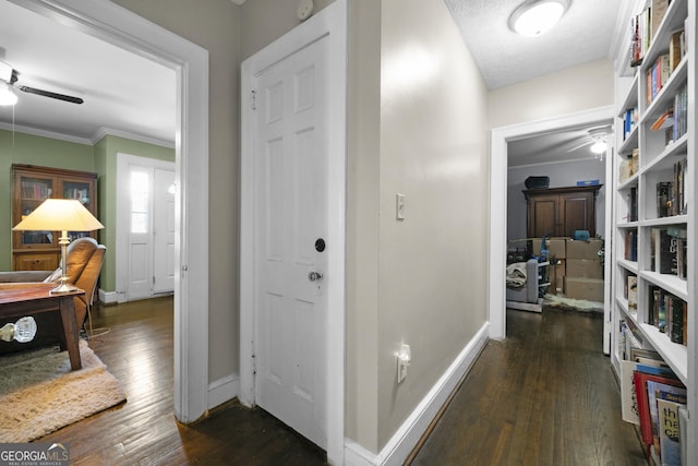 404 E 11th St SE, Rome, GA 30161 - corridor featuring baseboards, ornamental molding, and dark wood finished floors