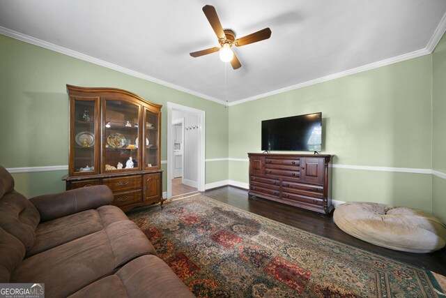 404 E 11th St SE, Rome, GA 30161 - living room with baseboards, ceiling fan, crown molding, and wood finished floors