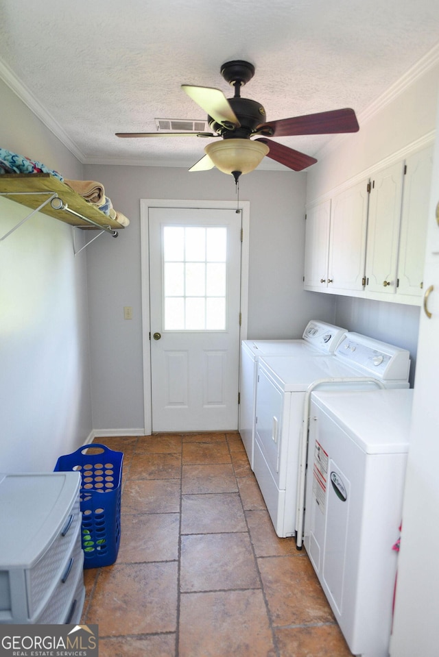 1737 Green Acres Dr, Vidalia, GA 30474 - washroom with visible vents, ornamental molding, washer and dryer, a ceiling fan, and cabinet space