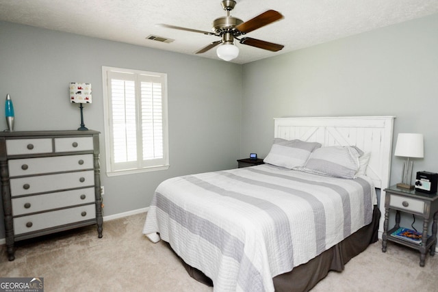 1737 Green Acres Dr, Vidalia, GA 30474 - bedroom featuring carpet floors, a ceiling fan, baseboards, and visible vents