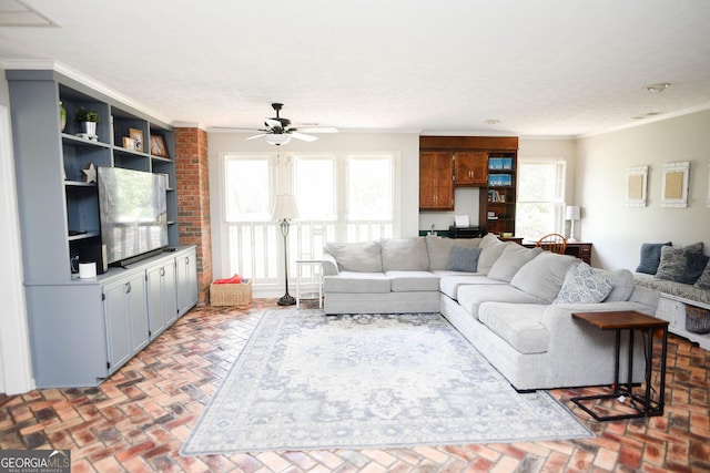 1737 Green Acres Dr, Vidalia, GA 30474 - living area with ceiling fan, plenty of natural light, and brick floor