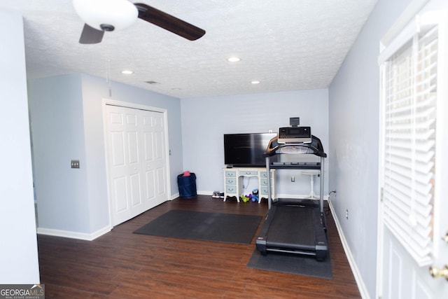 1737 Green Acres Dr, Vidalia, GA 30474 - workout area with baseboards, a textured ceiling, and wood finished floors