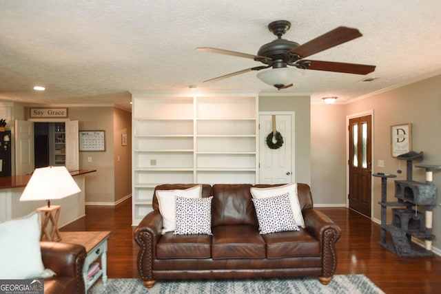 1737 Green Acres Dr, Vidalia, GA 30474 - living area with baseboards, ornamental molding, ceiling fan, and wood finished floors
