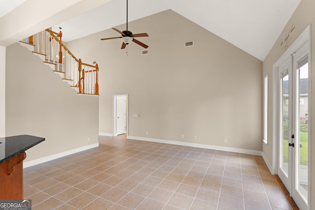 102 Herons Nest Cir, Kingsland, GA 31548 - unfurnished living room featuring ceiling fan, light tile patterned floors, and high vaulted ceiling