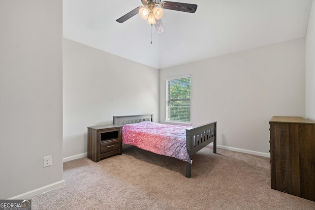 1314 Bentley Estates Dr, Dacula, GA 30019 - bedroom featuring light carpet, baseboards, ceiling fan, and vaulted ceiling