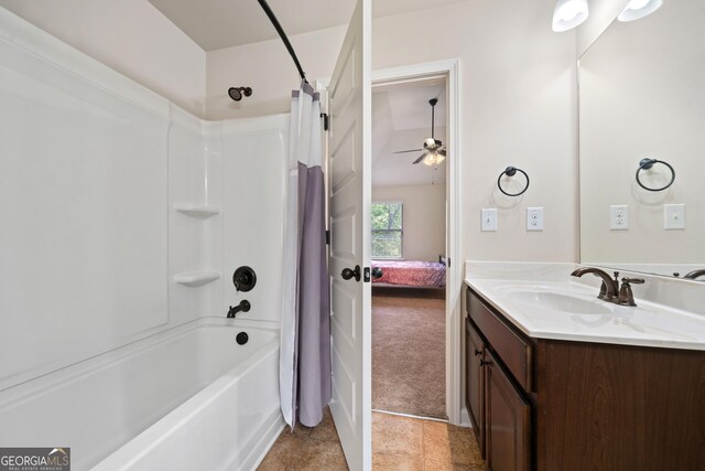 1314 Bentley Estates Dr, Dacula, GA 30019 - bathroom featuring vanity, a ceiling fan, shower / tub combo with curtain, and ensuite bath