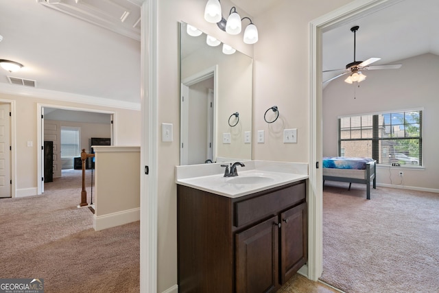 1314 Bentley Estates Dr, Dacula, GA 30019 - bathroom with ceiling fan, vaulted ceiling, vanity, and baseboards