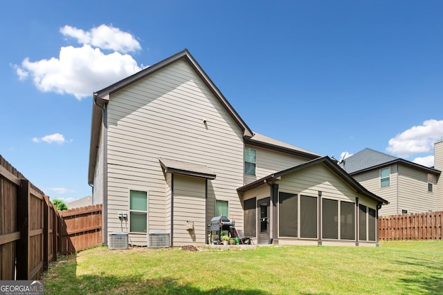 1314 Bentley Estates Dr, Dacula, GA 30019 - back of property with a sunroom