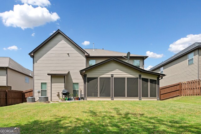 1314 Bentley Estates Dr, Dacula, GA 30019 - rear view of house featuring a sunroom