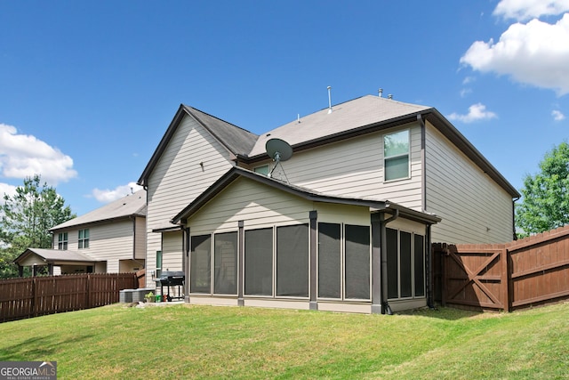 1314 Bentley Estates Dr, Dacula, GA 30019 - back of house featuring a sunroom