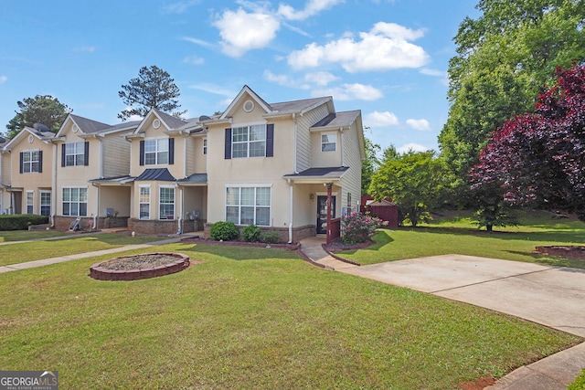 7293 Bridlewood Ct, Jonesboro, GA 30236 - view of front of property featuring a front lawn and stucco siding