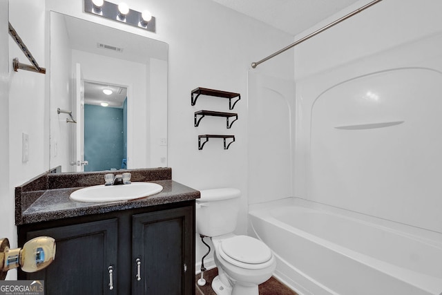 7293 Bridlewood Ct, Jonesboro, GA 30236 - bathroom with vanity, washtub / shower combination, toilet, and visible vents