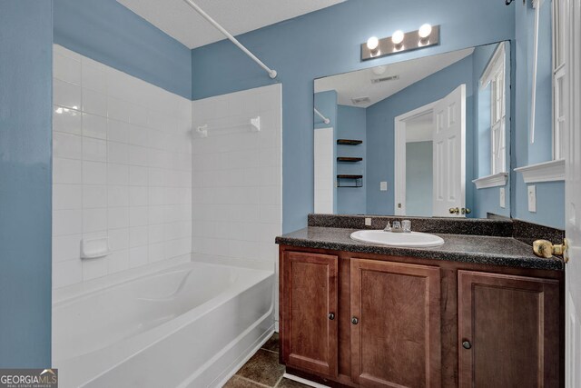 7293 Bridlewood Ct, Jonesboro, GA 30236 - bathroom with vanity, shower / bathtub combination, and visible vents