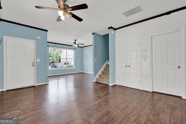 7293 Bridlewood Ct, Jonesboro, GA 30236 - unfurnished living room featuring ceiling fan, visible vents, ornamental molding, and dark wood finished floors