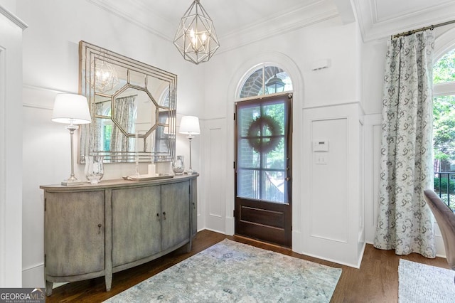 611 Timm Valley Rd NE Unit 2, Atlanta, GA 30305 - entryway featuring crown molding, wood finished floors, and a chandelier