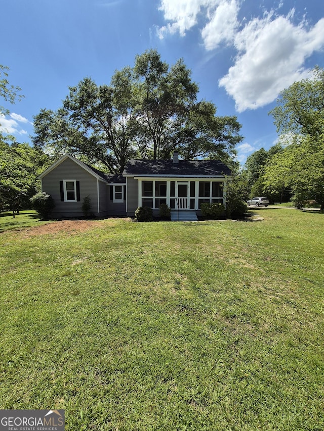 127 S Church St, Bogart, GA 30622 - back of house with a sunroom and a lawn