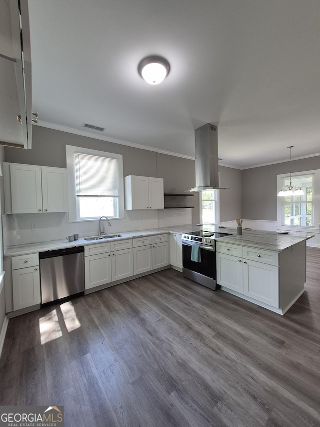 127 S Church St, Bogart, GA 30622 - kitchen featuring a peninsula, island exhaust hood, a sink, stainless steel appliances, and ornamental molding