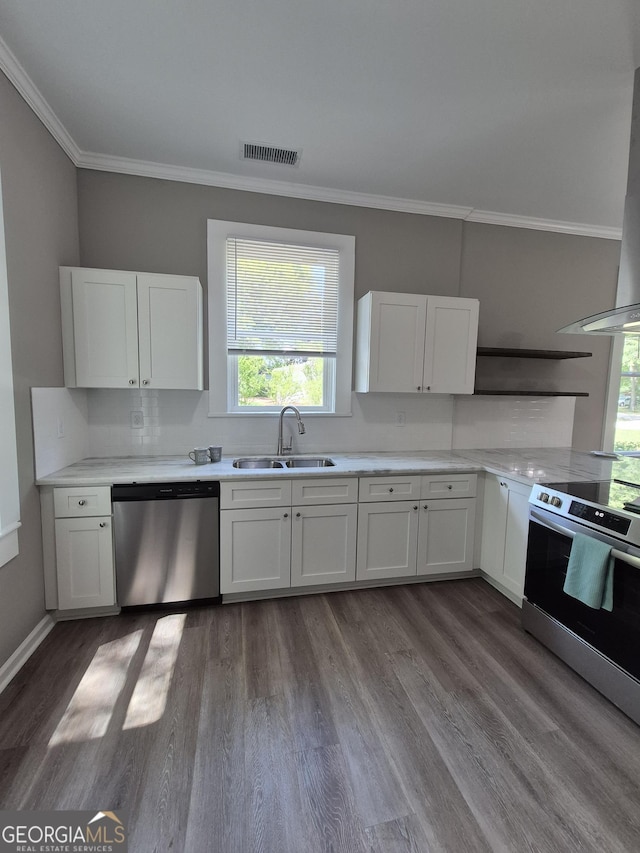 127 S Church St, Bogart, GA 30622 - kitchen with a sink, stainless steel appliances, crown molding, a wealth of natural light, and wall chimney range hood