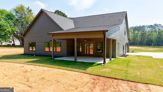 4731 H D Atha Rd, Covington, GA 30014 - rear view of property featuring a patio, a ceiling fan, and a shingled roof