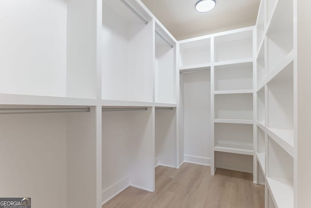 4731 H D Atha Rd, Covington, GA 30014 - spacious closet with light wood-style floors
