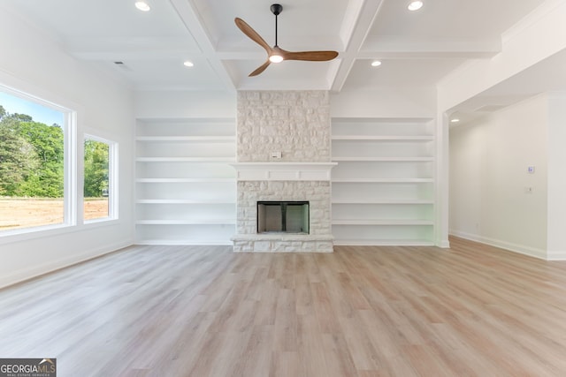 4731 H D Atha Rd, Covington, GA 30014 - unfurnished living room with a ceiling fan, built in features, recessed lighting, beamed ceiling, and wood finished floors