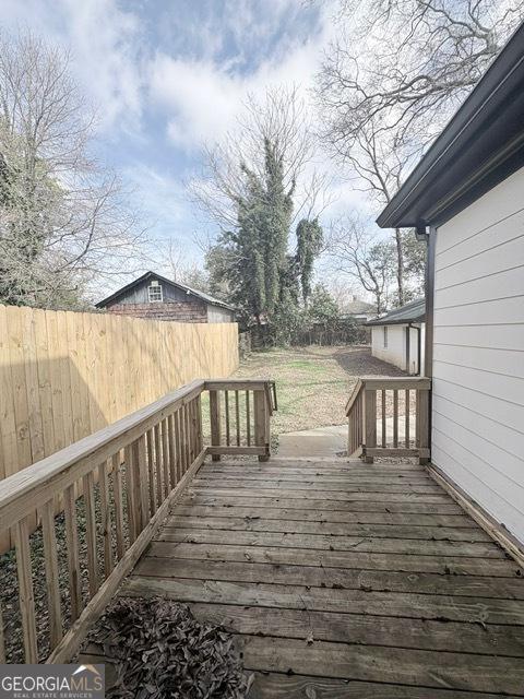 deck featuring a fenced backyard