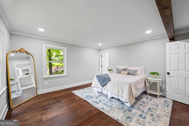 bedroom with crown molding, recessed lighting, baseboards, and wood finished floors