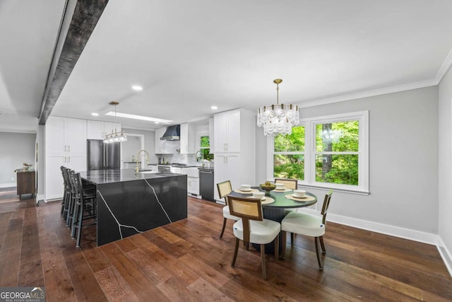 dining space with dark wood finished floors, baseboards, a chandelier, ornamental molding, and recessed lighting