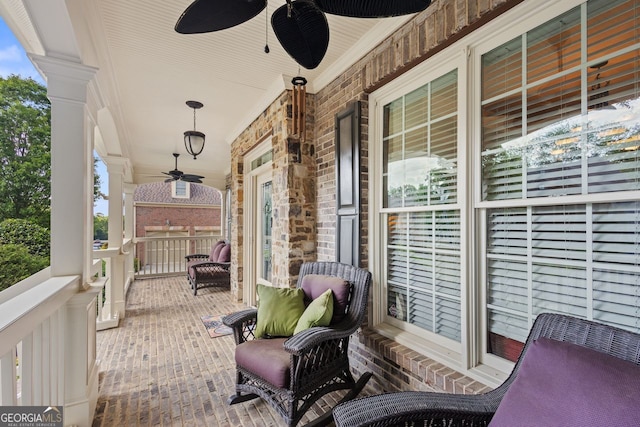 view of patio / terrace with ceiling fan and covered porch