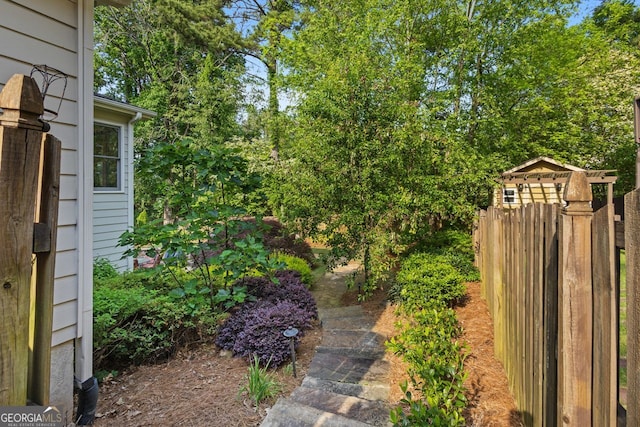 view of yard with fence