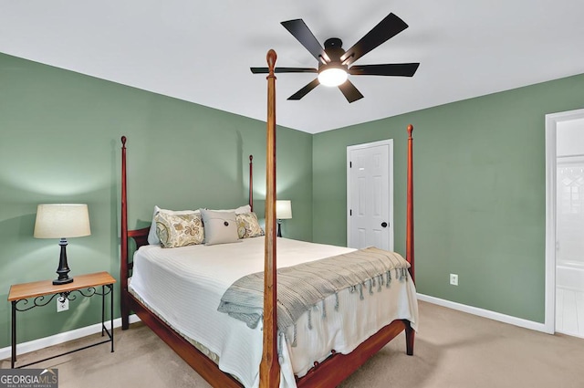 carpeted bedroom with baseboards and ceiling fan
