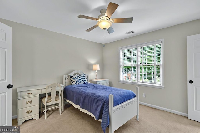 bedroom with visible vents, carpet, ceiling fan, and baseboards