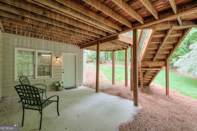 view of patio / terrace featuring stairway
