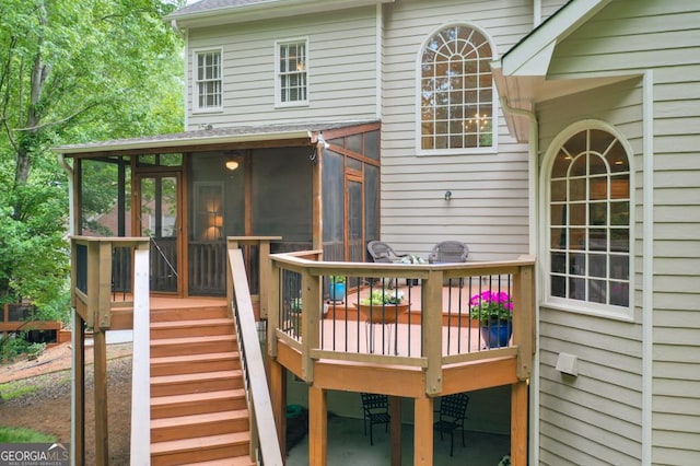 deck featuring a sunroom
