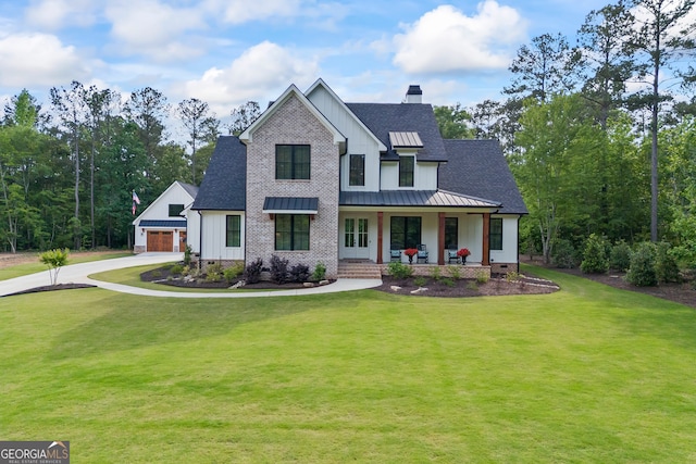 view of front of house with a porch, a front lawn, board and batten siding, and a standing seam roof