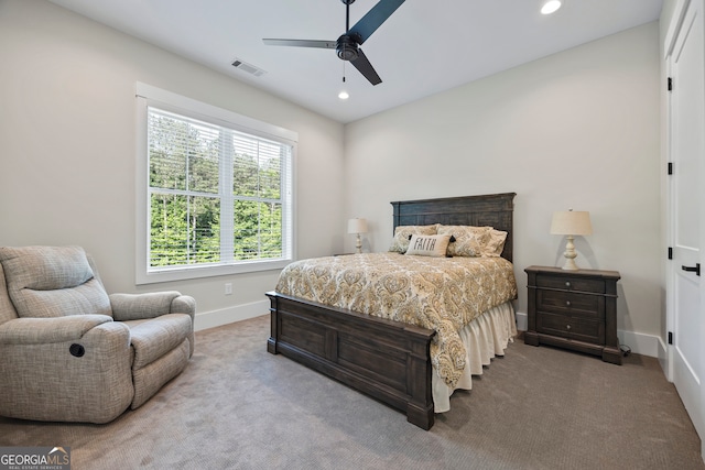 carpeted bedroom with recessed lighting, baseboards, visible vents, and a ceiling fan