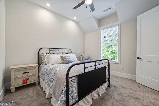 bedroom with visible vents, lofted ceiling, baseboards, recessed lighting, and carpet