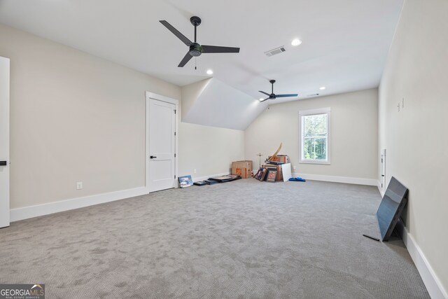recreation room featuring carpet floors, a ceiling fan, baseboards, and visible vents