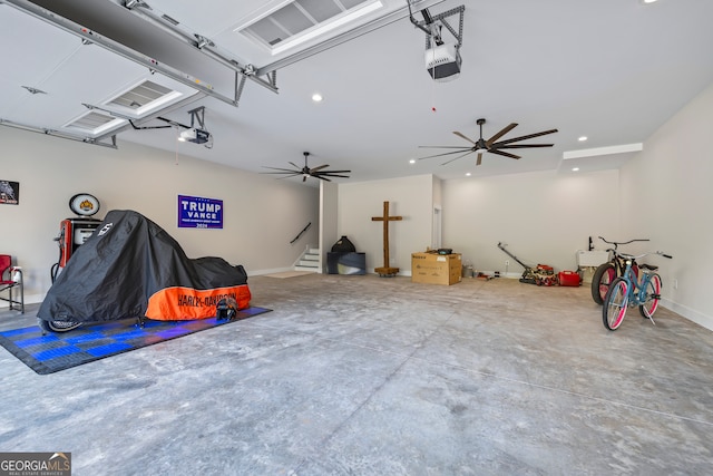 garage with recessed lighting, ceiling fan, and a garage door opener