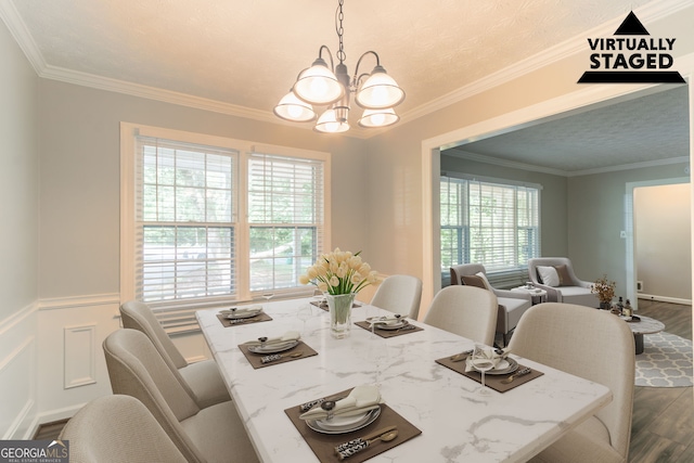 2814 Brackenwood Dr, Snellville, GA 30039 - dining room with a chandelier, dark wood finished floors, crown molding, and a wainscoted wall