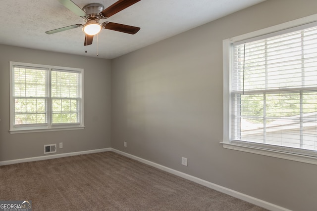 2814 Brackenwood Dr, Snellville, GA 30039 - empty room featuring a ceiling fan and carpet floors