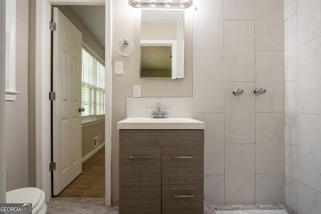 2814 Brackenwood Dr, Snellville, GA 30039 - bathroom with vanity and a tile shower