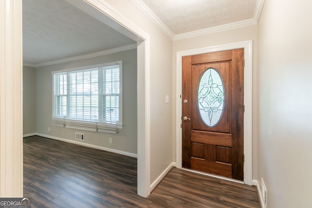 2814 Brackenwood Dr, Snellville, GA 30039 - foyer with plenty of natural light, dark wood-style flooring, crown molding, and a textured ceiling