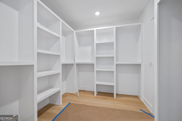 4751 H D Atha Rd, Covington, GA 30014 - spacious closet featuring wood finished floors