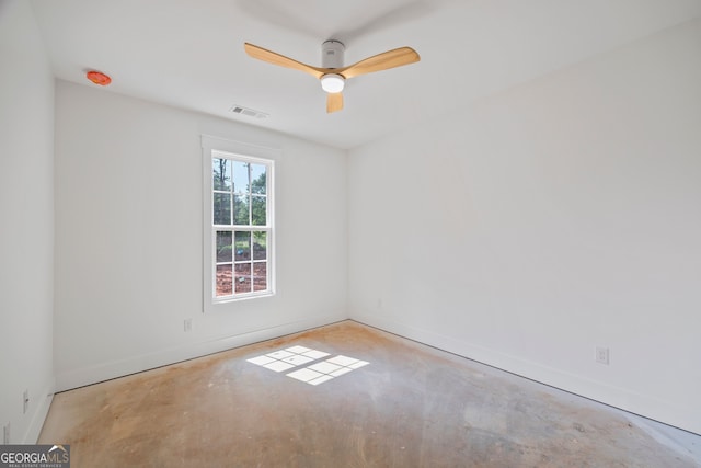 4751 H D Atha Rd, Covington, GA 30014 - spare room with concrete flooring and a ceiling fan