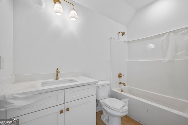 4751 H D Atha Rd, Covington, GA 30014 - bathroom featuring vanity, bathtub / shower combination, and wood finished floors