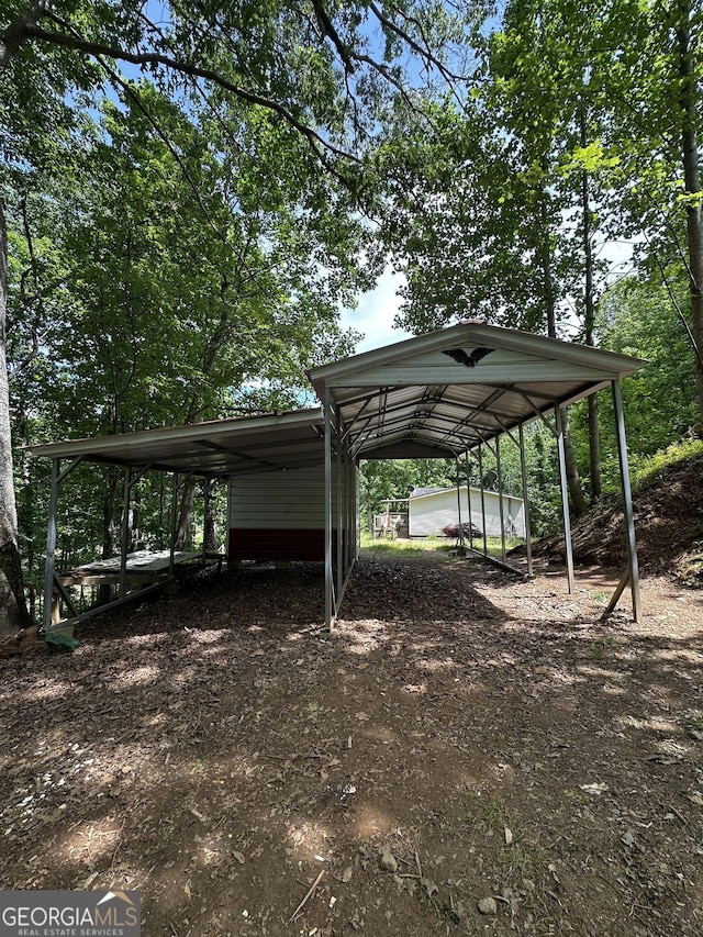 341 Mountain Lake View Dr, Jasper, GA 30143 - view of vehicle parking with a carport