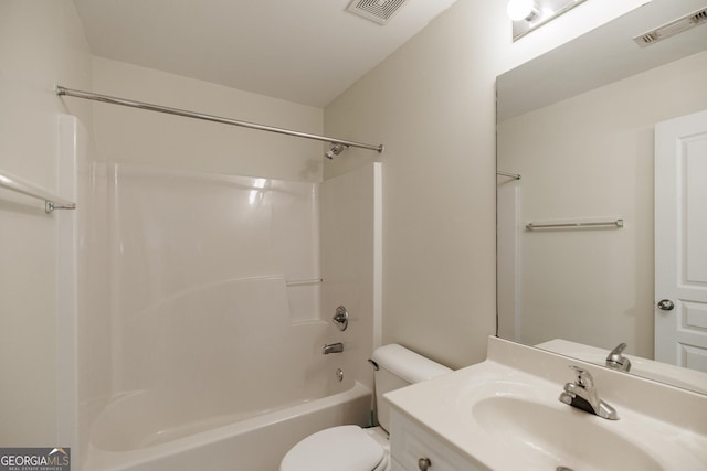 bathroom featuring vanity, toilet, shower / tub combination, and visible vents