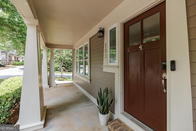 entrance to property with a porch